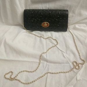 NWOT Black Embossed Coach Clutch